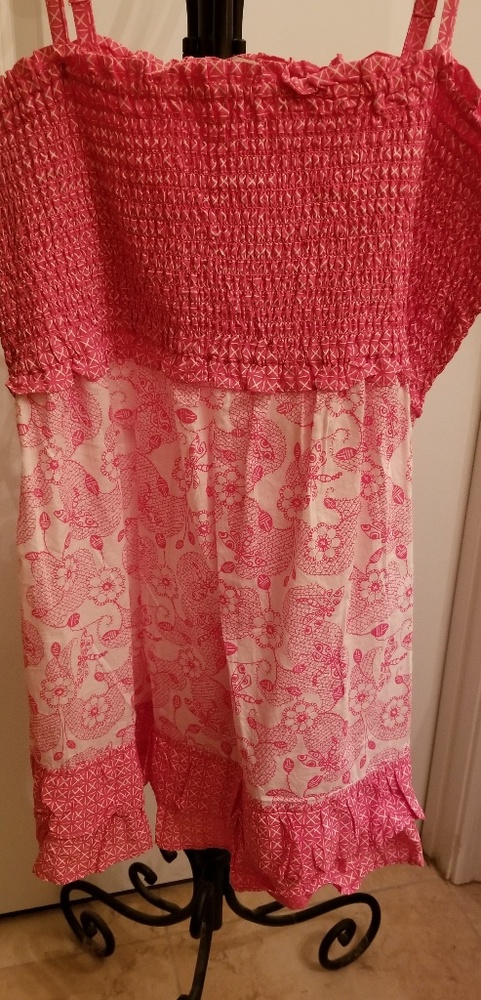 Floral, smocked, and ruffled, halter top.